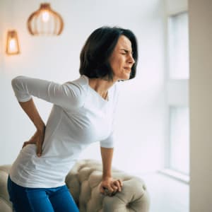 Back Pain - Symptom of Osteoporosis